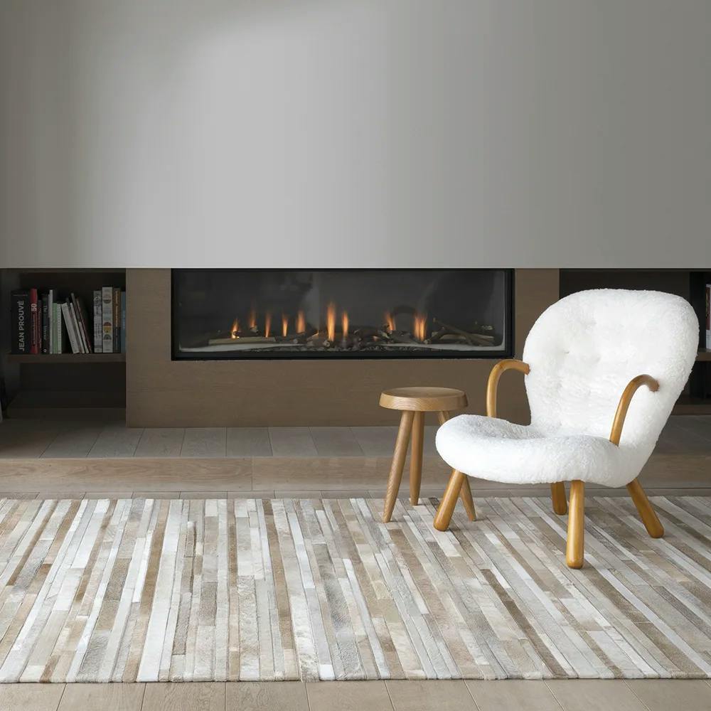 surround yourself in comfort: flash beige leather pieced rug in living room
