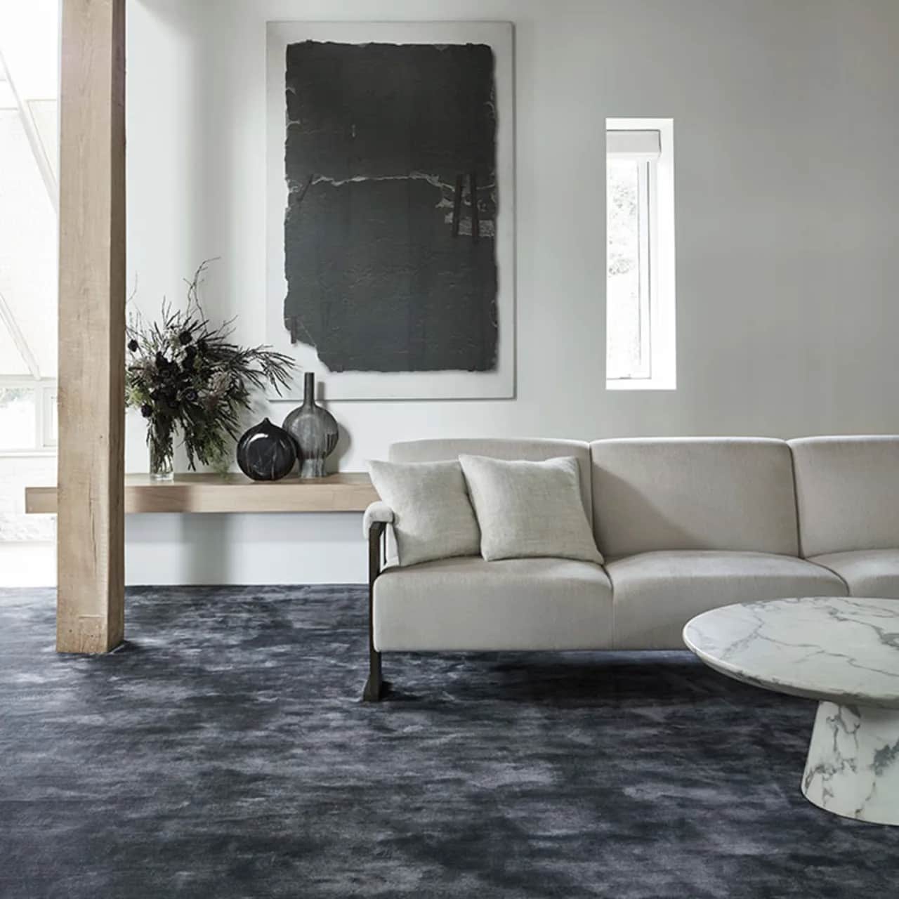 enveloped: like the depth of the ocean, kheri's delphinium carpet creates a mysterious foundation.