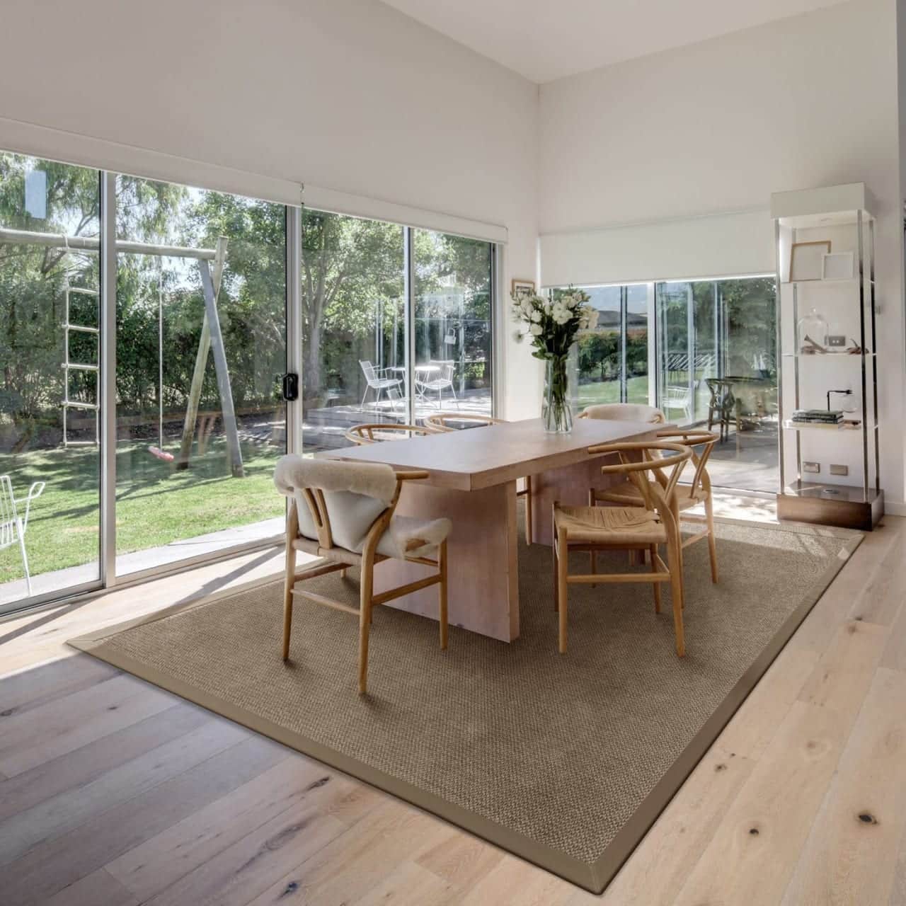Cottage Bark area rug with cloth border in Scandinavian style dining room