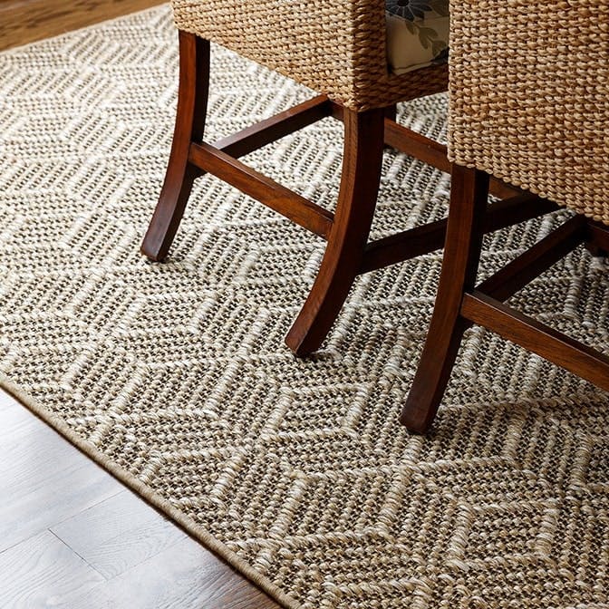 Greenbrier Driftwood dining room sisal area rug with serged border