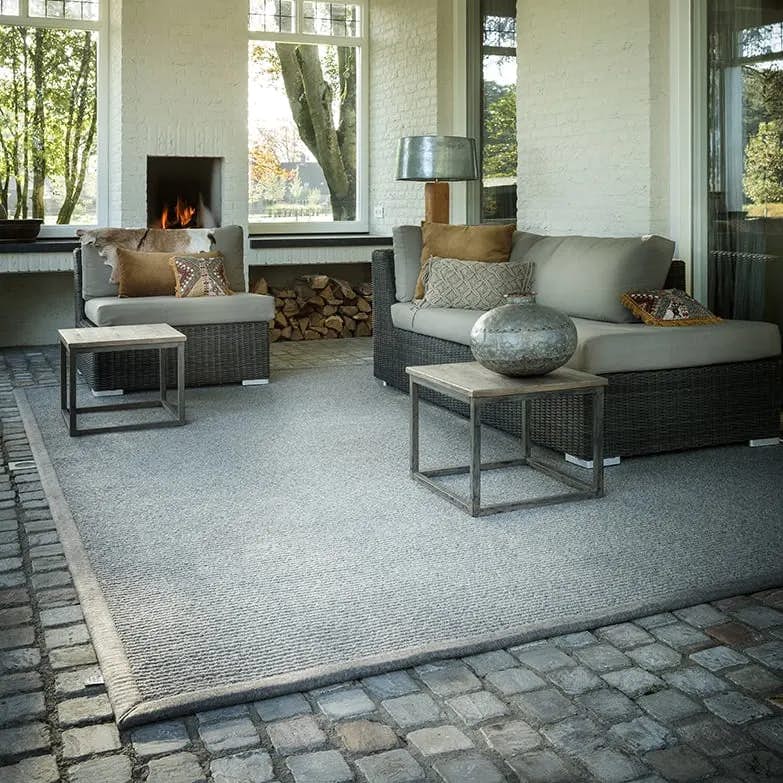 The Hi-Low Tin wool rug in covered patio