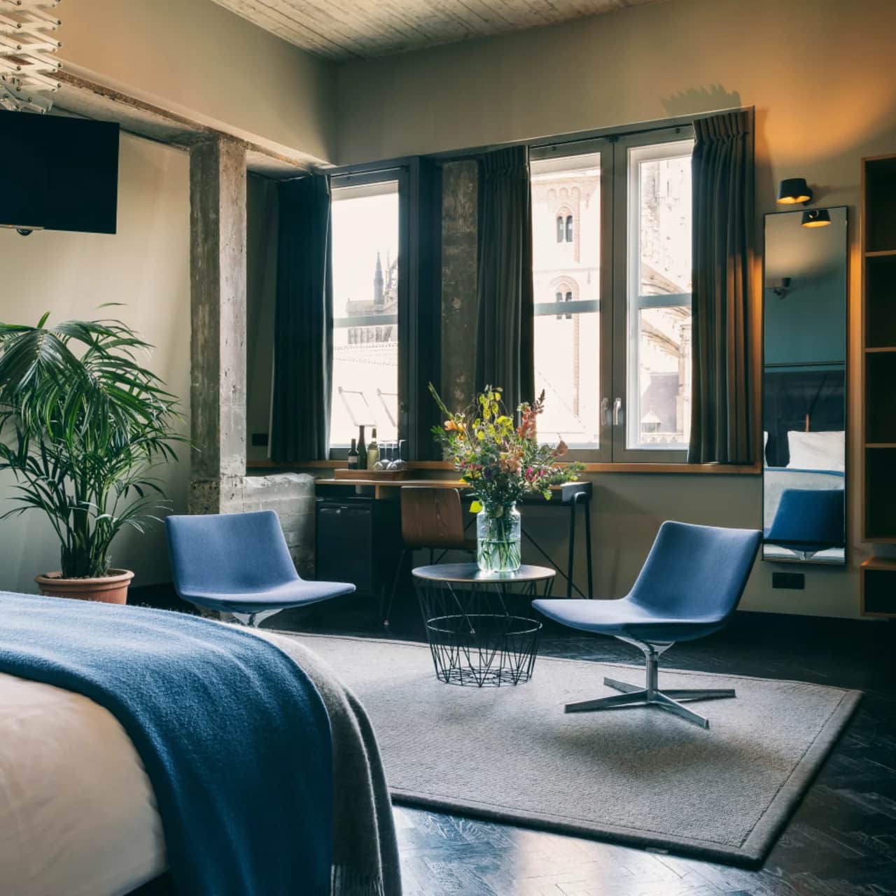 Let It Rib wool rug with a cloth border in bedroom