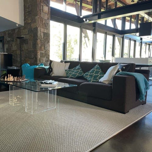 Beachfront Glacial Loop synthetic area rug in mountain home living room